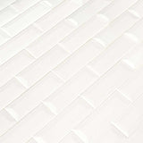 Whisper white beveled 12X12 ceramic mesh mounted mosaic wall tile SMOT-PT-WW-2X6B product shot multiple tiles angle view