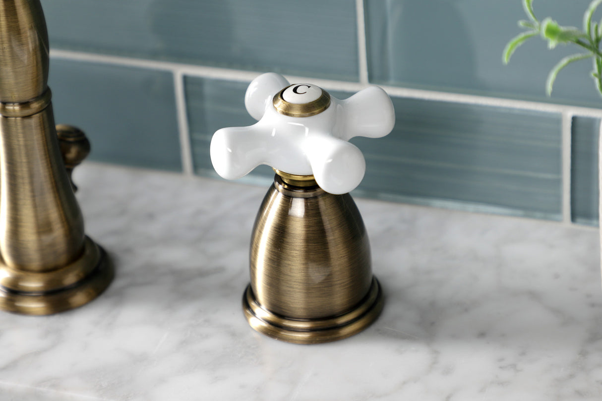 Kingston Brass KB1973PX Heritage Widespread Bathroom Faucet with Brass Pop-Up, Antique Brass