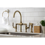 Kingston Brass KS2333KL Whitaker Industrial Style Bridge Kitchen Faucet with Brass Sprayer, Antique Brass