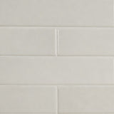 Renzo dove 3x12 glossy ceramic white wall tile NRENDOV3X12 product shot multiple tiles angle view #Size_3"x12"