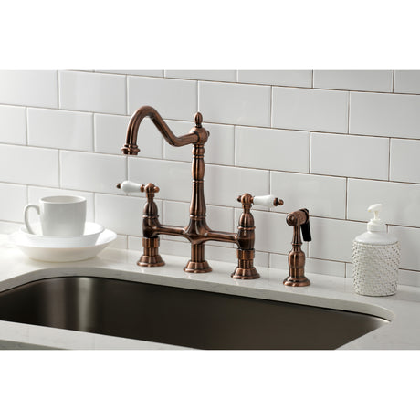 Kingston Brass KS127PLBSAC Heritage Bridge Kitchen Faucet with Brass Sprayer, Antique Copper