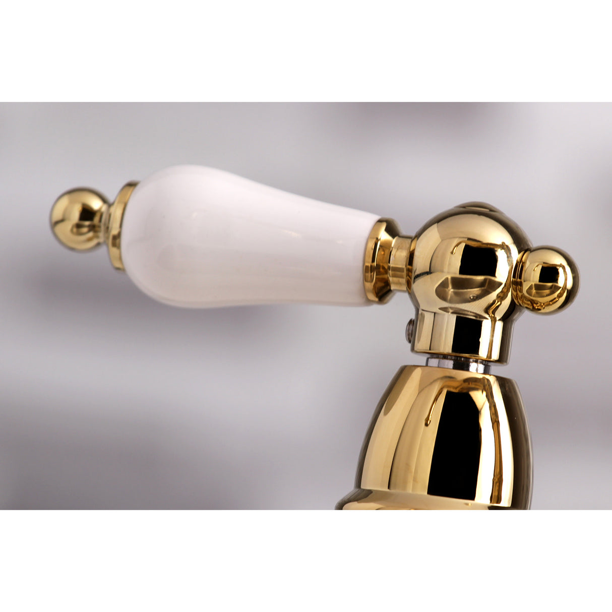 Kingston Brass KS3272PLBS Restoration 8" Bridge Kitchen Faucet with Sprayer, Polished Brass