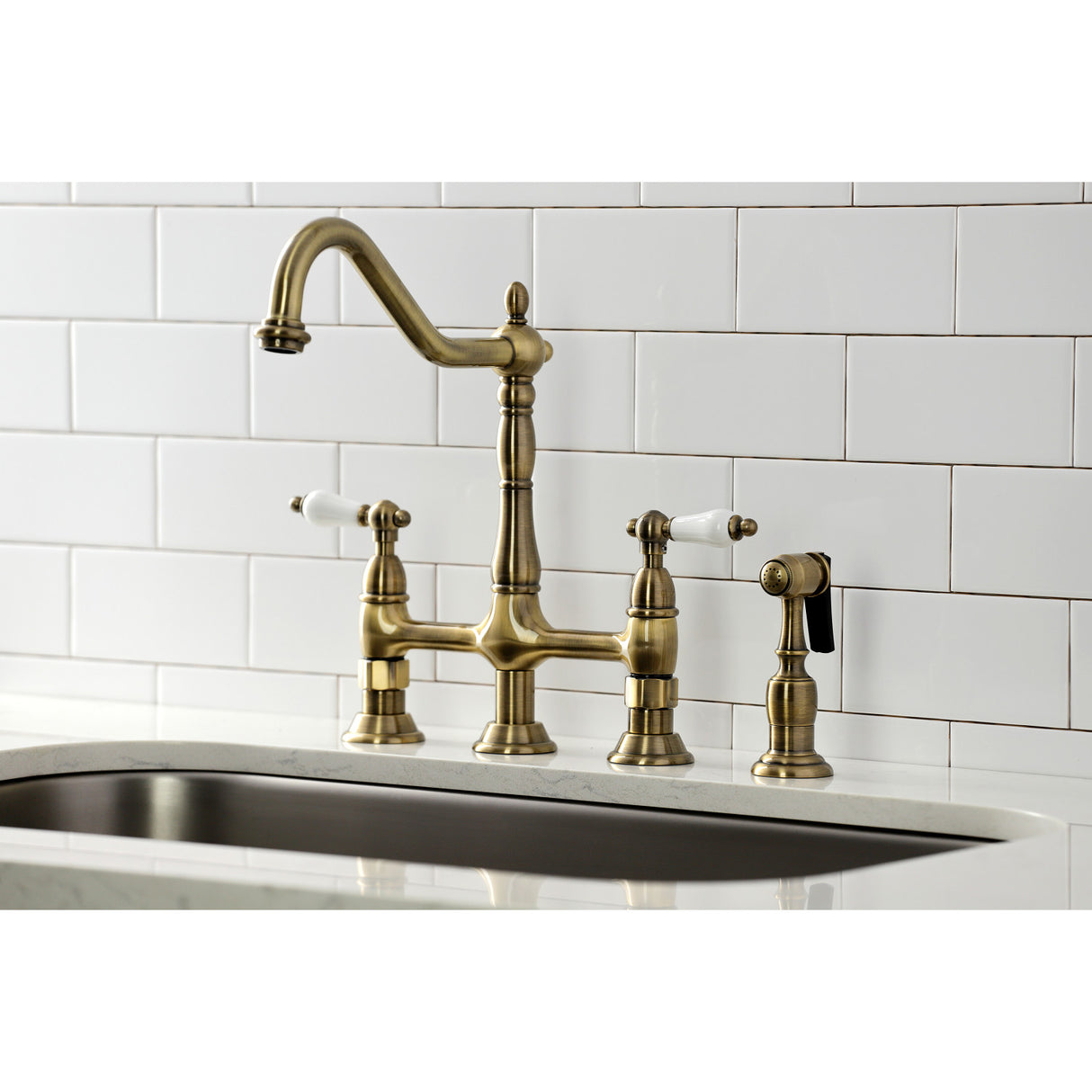 Kingston Brass KS1273PLBS Heritage Bridge Kitchen Faucet with Brass Sprayer, Antique Brass