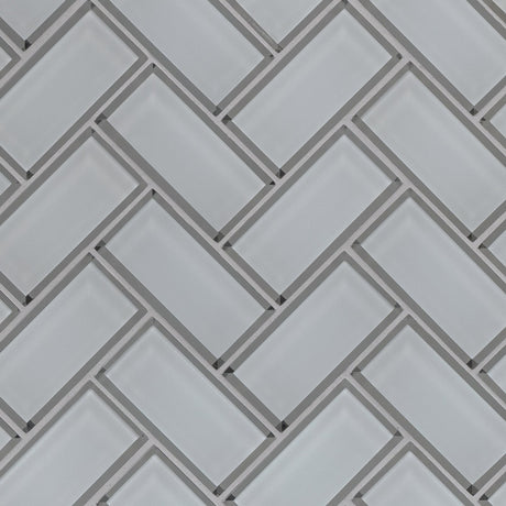 Ice bevel herringbone 11.08X13.86 glass mesh mounted mosaic tile SMOT-GLS-ICEBEHB8MM product shot multiple tiles angle view