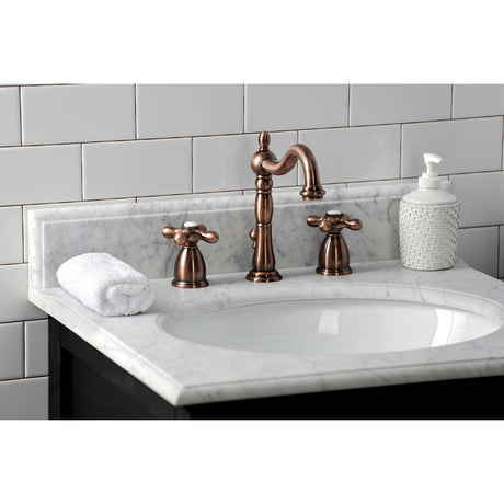 Kingston Brass KB197AXAC Heritage Widespread Bathroom Faucet with Brass Pop-Up, Antique Copper