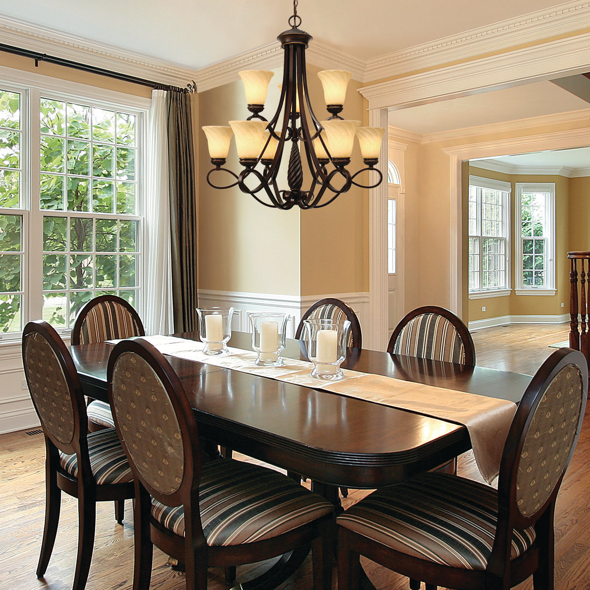 Torbellino 2 Tier - 9 Light Chandelier in Cordoban Bronze with Remolino Glass