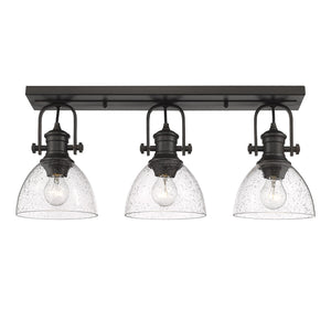 Hines 3-Light Bath Vanity in Rubbed Bronze with Seeded Glass