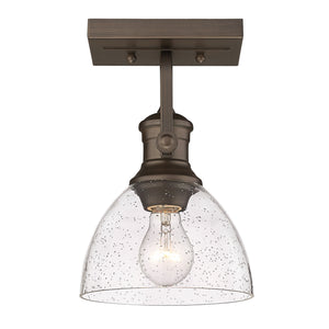 Hines 1-Light Bath Vanity in Rubbed Bronze with Seeded Glass