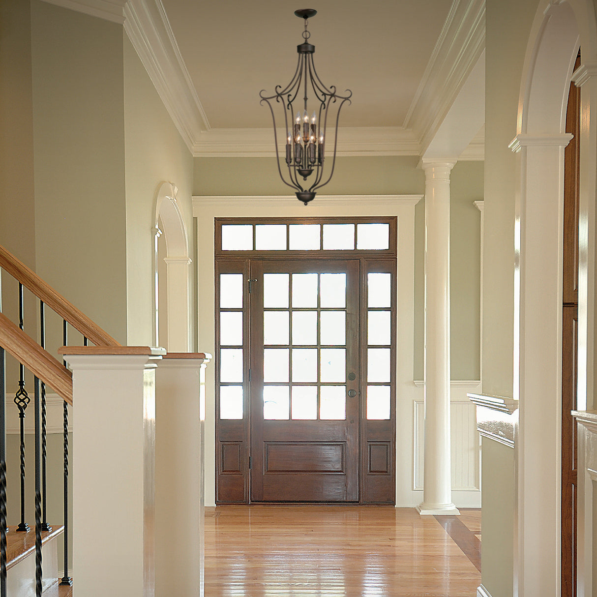 Multi-Family 2 Tier - 9 Light Caged Foyer in Rubbed Bronze with Drip Candlesticks