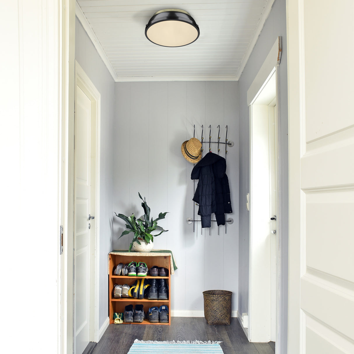Duncan 14" Flush Mount in Aged Brass with a Matte Black Shade