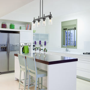 Winslett Linear Pendant in Matte Black with Ribbed Clear Glass Shades