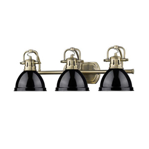Duncan 3 Light Bath Vanity in Aged Brass with a Black Shade