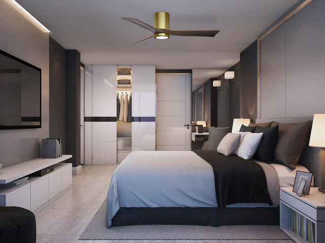Matthews Fan IR3HLK-BRBR-WA-42 Irene-3HLK three-blade flush mount paddle fan in Brushed Brass finish with 42” solid walnut tone blades and integrated LED light kit.
