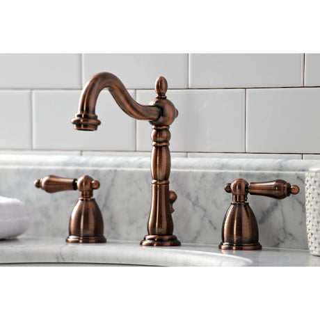 Kingston Brass KB197ALAC Heritage Widespread Bathroom Faucet with Brass Pop-Up, Antique Copper