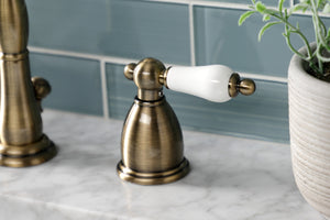 Kingston Brass KB1973PL Heritage Widespread Bathroom Faucet with Brass Pop-Up, Antique Brass