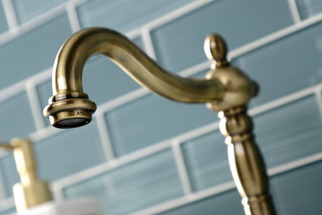 Kingston Brass KB1973PL Heritage Widespread Bathroom Faucet with Brass Pop-Up, Antique Brass