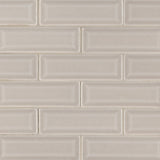 Portico pearl beveled 12X12 glossy ceramic mesh mounted mosaic tile SMOT-PT-PORPEA-2X6B product shot multiple tiles angle view