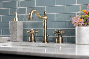 Kingston Brass KB1973AX Heritage Widespread Bathroom Faucet with Brass Pop-Up, Antique Brass