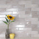 Renzo sterling 3x12 glossy ceramic gray wall tile NRENSTE3X12 product shot multiple tiles angle view #Size_3"x12"