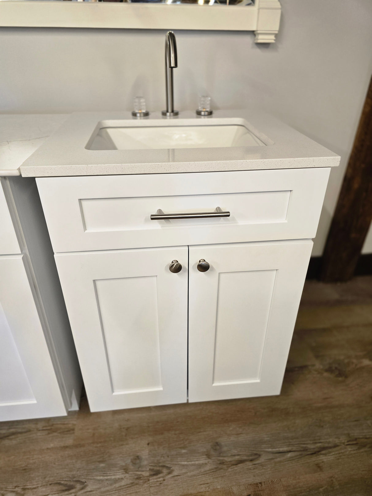 24" White Cabtec Vanity Set with Custom Quartz Top and Fasetted Brushed Nickel Faucet