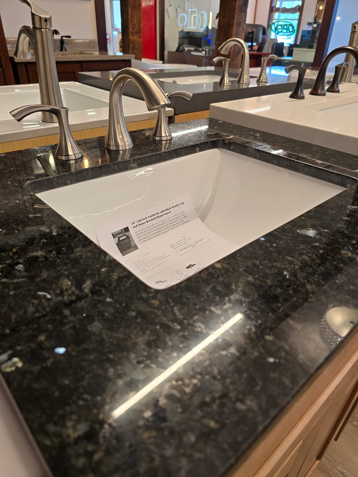 24" CabTec Vanity Set with Black Granite Top and Danze Brushed Nickel Faucet