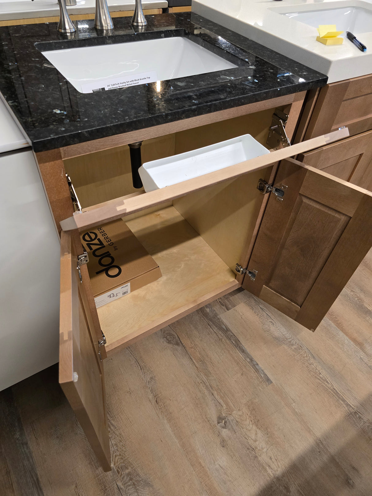 24" CabTec Vanity Set with Black Granite Top and Danze Brushed Nickel Faucet
