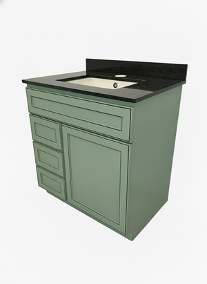 Green bathroom vanity with black countertop and sink on a white background