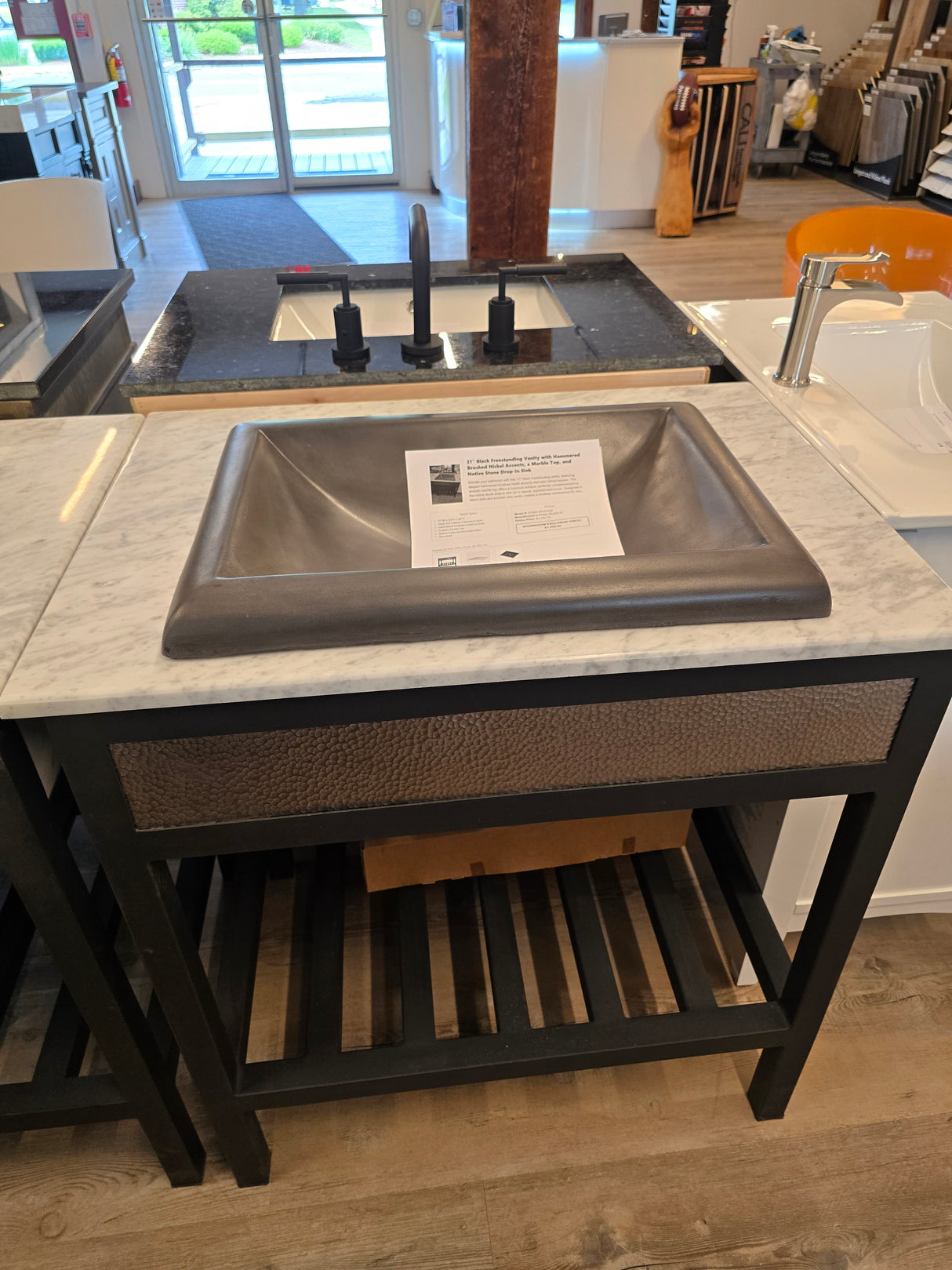 31" Black Freestanding Vanity with Hammered Brushed Nickel Accents, a Marble Top, and Native Stone Drop-In Sink