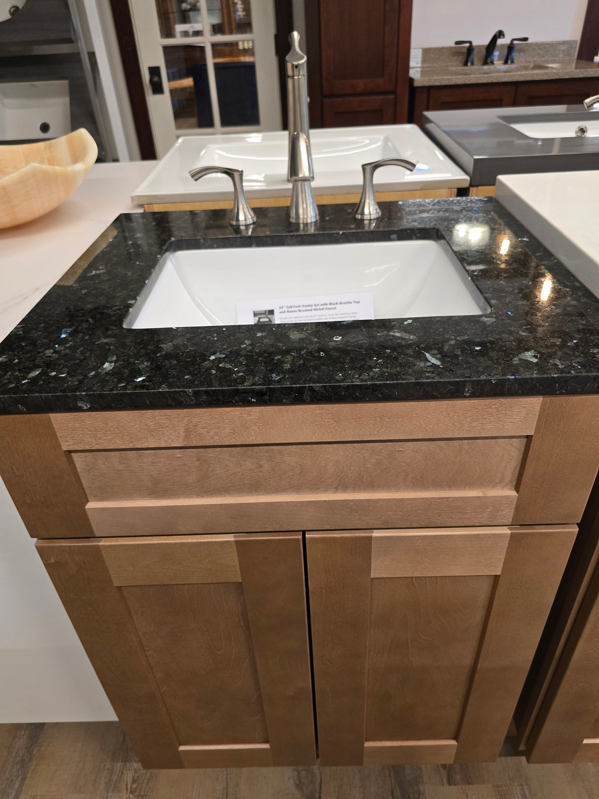 24" CabTec Vanity Set with Black Granite Top and Danze Brushed Nickel Faucet