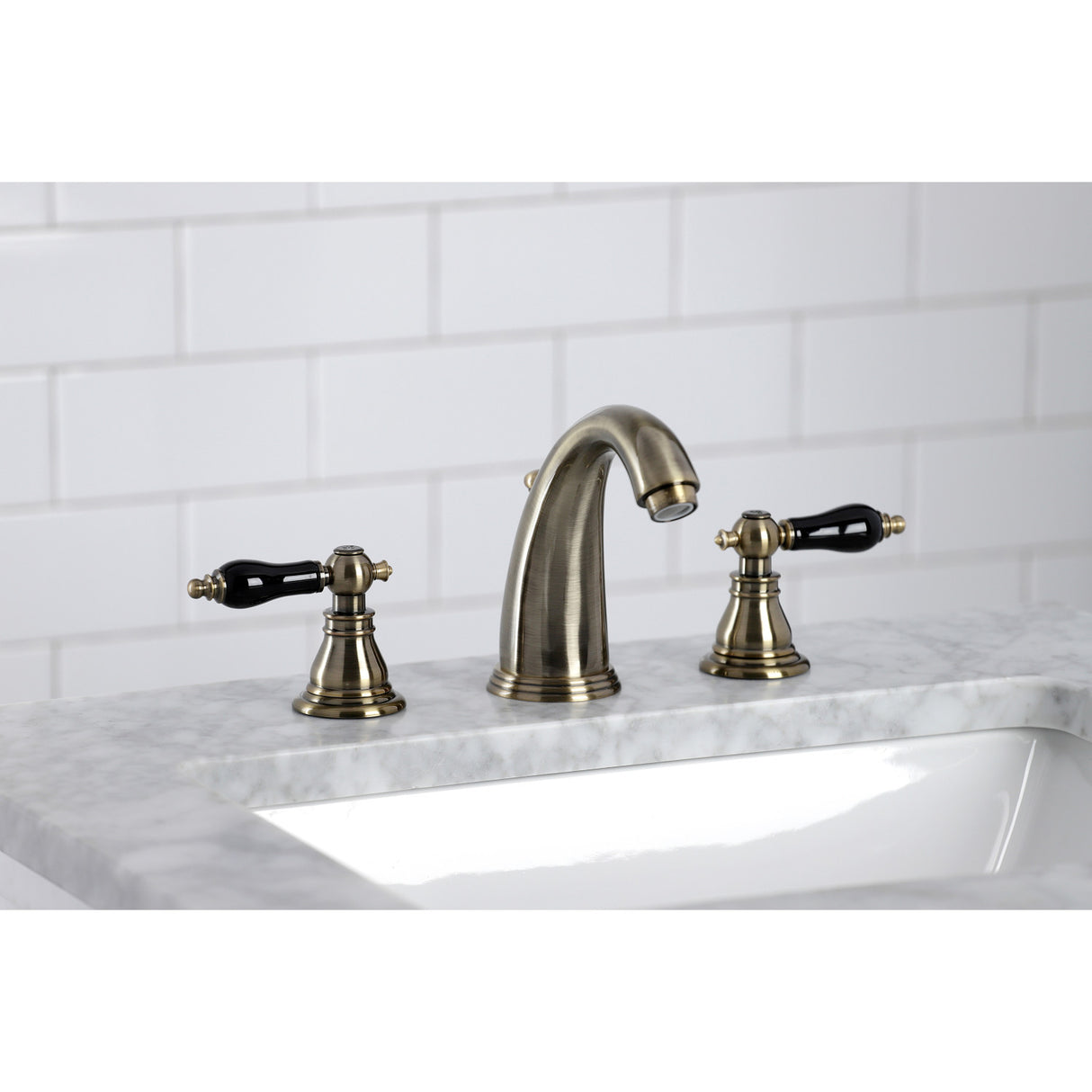 Kingston Brass KB983AKLAB Duchess Widespread Bathroom Faucet with Plastic Pop-Up, Antique Brass
