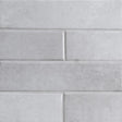 Renzo sterling 3x12 glossy ceramic gray wall tile NRENSTE3X12 product shot multiple tiles angle view #Size_3"x12"