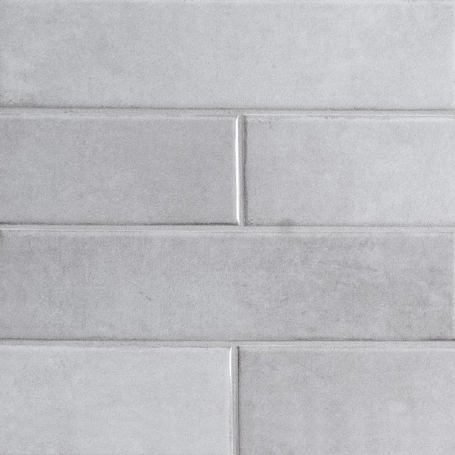 Renzo sterling 3x12 glossy ceramic gray wall tile NRENSTE3X12 product shot multiple tiles angle view #Size_3"x12"