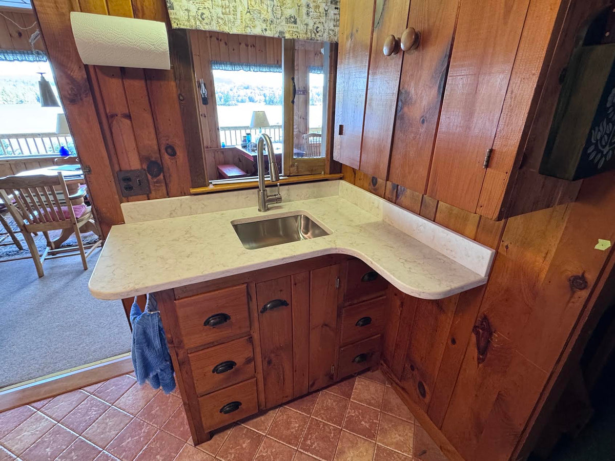 Lakefront cottage kitchen with new white Viatera quartz countertop, undermount stainless sink and pull-down faucet, Stoddard NH