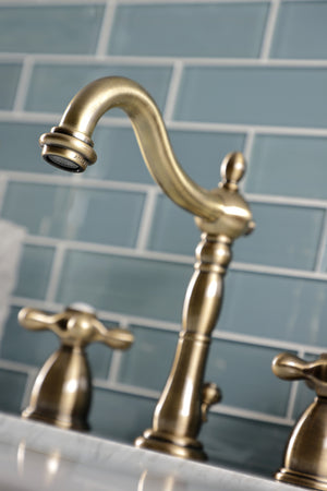 Kingston Brass KB1973AX Heritage Widespread Bathroom Faucet with Brass Pop-Up, Antique Brass