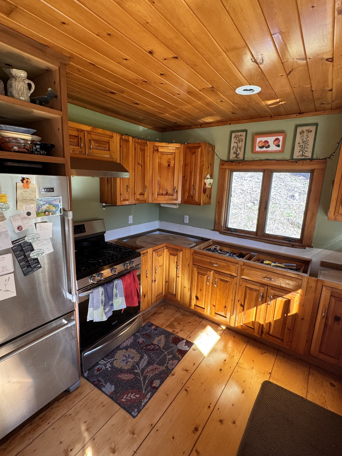 Before: original Vermont cottage kitchen layout from the doorway